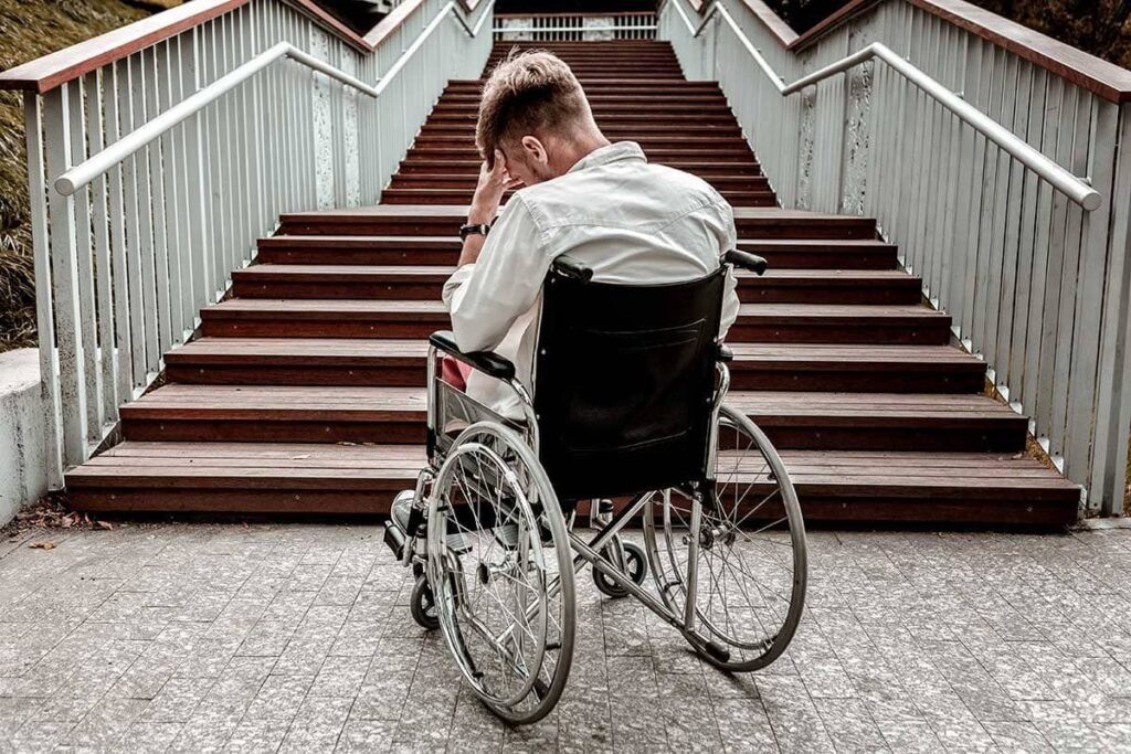 wheelchair user on stairs