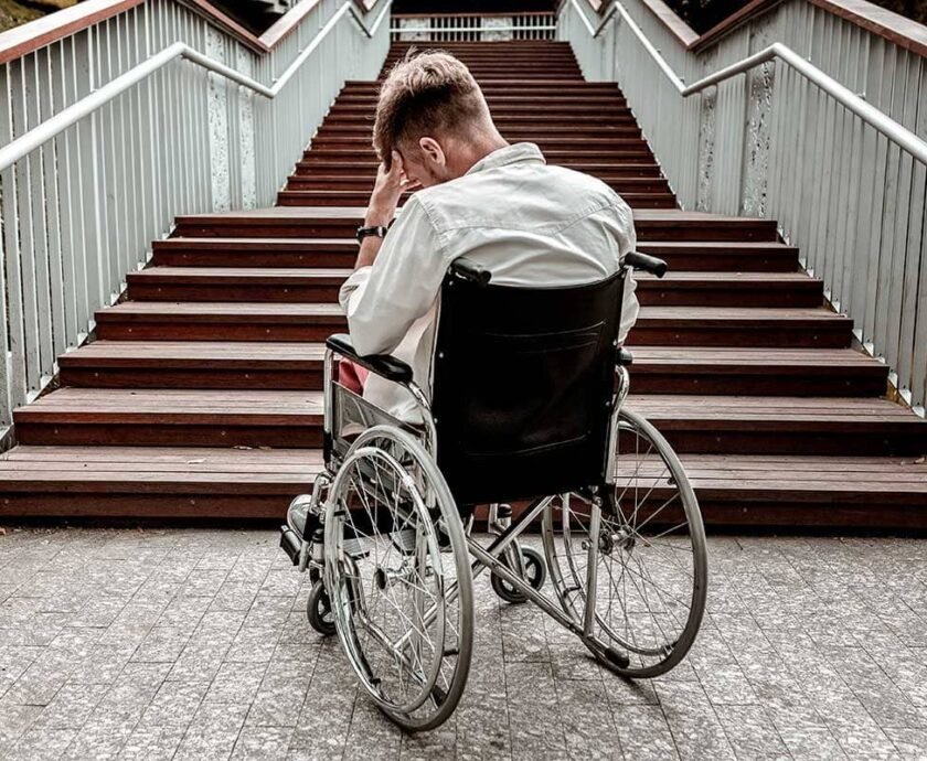 wheelchair user on stairs